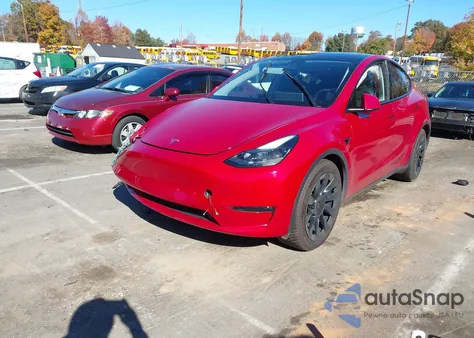 2023 Tesla Model Y Awd/Long Range Dual Motor All-Wheel Drive z USA, uszkodzony, nr VIN 7SAYGDEE0PA165391
